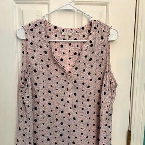Sleeveless pink and black blouse